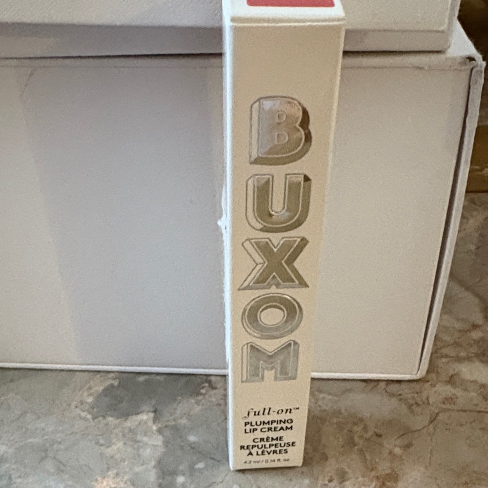 Buxom Full-On Lip Cream in Cream Packaging